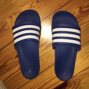 Blue adidas slides